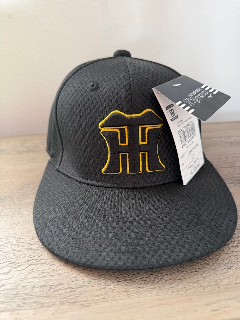 Mizuno Kids Black Hat with Yellow Embroidered Logo